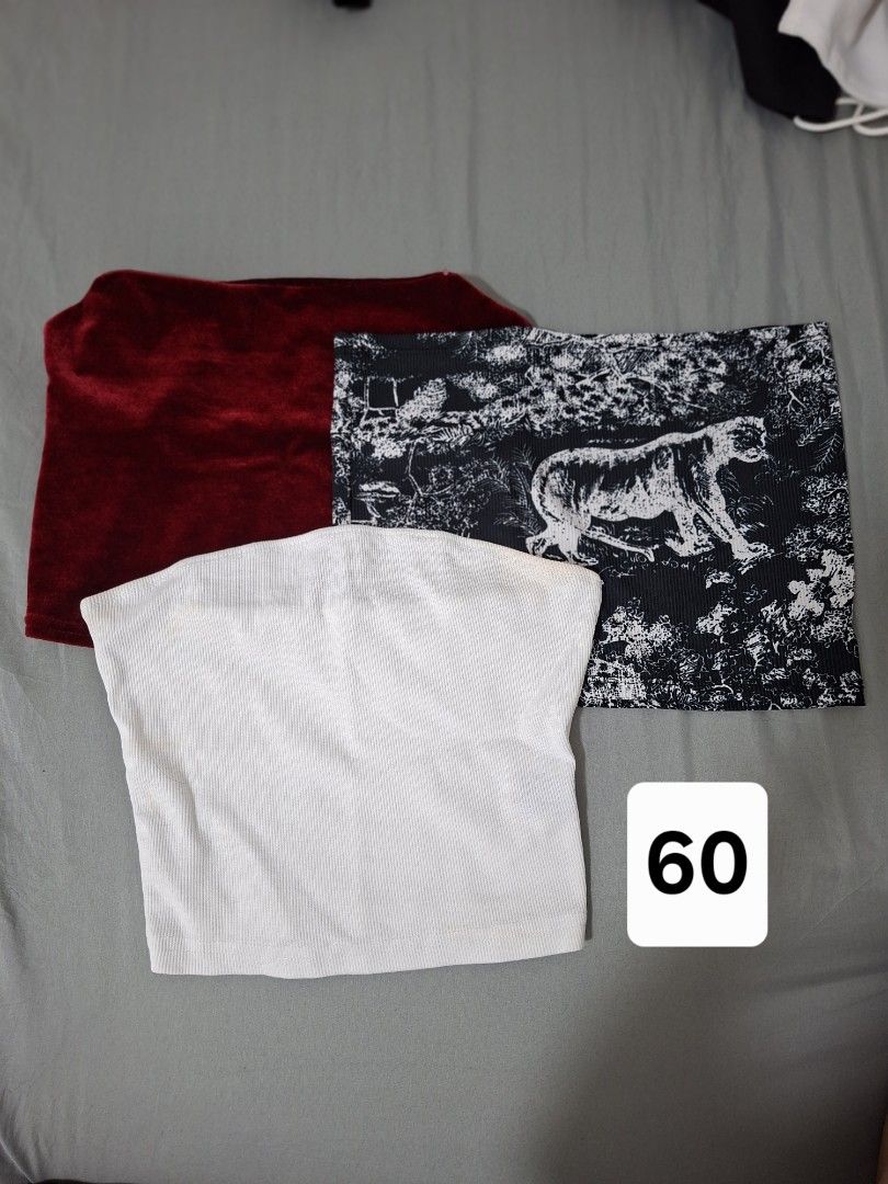 Assorted Crop Tops Bundle - Various Styles and Colors (Category: Shirts) located in Taguig. Submitted by abuanbea (Listing ID 1467676861, Image 2). Description: - Bundle includes assorted crop tops: tank tops, tube tops, and short sleeve styles - Features various colors and prints like floral, solid white, black, and orange - Assorted necklines including scoop neck, halter, and off-shoulder designs - Made with a mix of comfortable ribbed and smoo