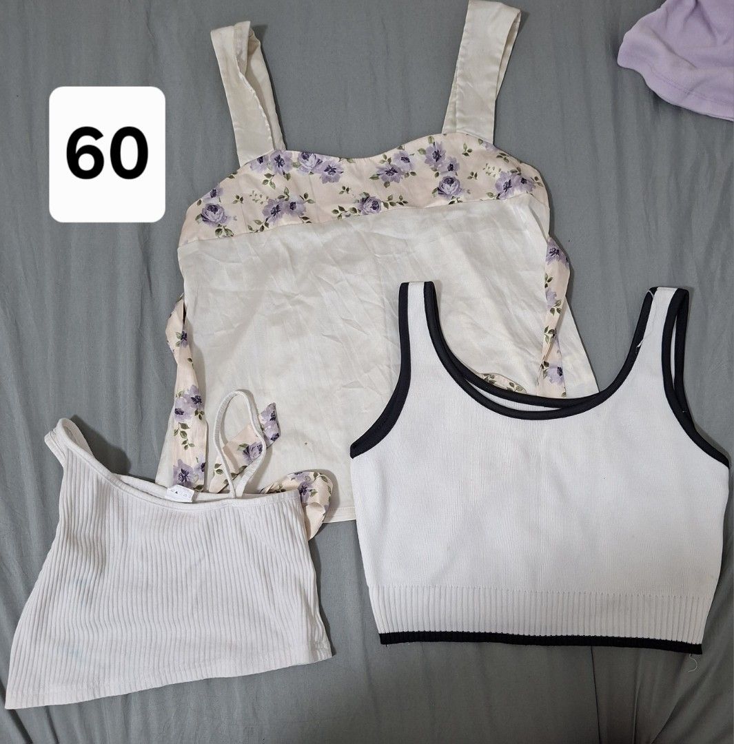 Assorted Crop Tops Bundle - Various Styles and Colors (Category: Shirts) located in Taguig. Submitted by abuanbea (Listing ID 1467676861, Image 1). Description: - Bundle includes assorted crop tops: tank tops, tube tops, and short sleeve styles - Features various colors and prints like floral, solid white, black, and orange - Assorted necklines including scoop neck, halter, and off-shoulder designs - Made with a mix of comfortable ribbed and smoo