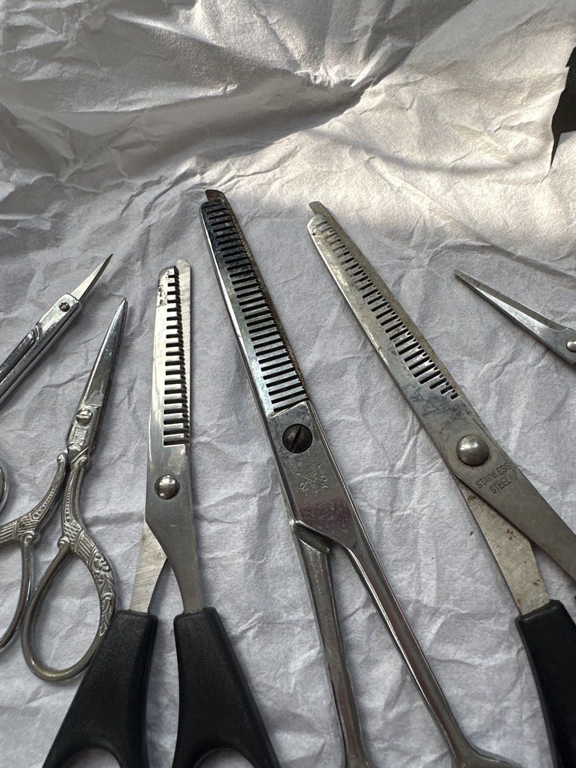 Assorted Hair Cutting and Thinning Scissors Set (Category: Hair) located in Cainta. Submitted by shopbyyna (Listing ID 1467607357, Image 2). Description: - Complete hair cutting set: includes texturizing shears, thinning scissors, and standard cutting scissors - Design: mixed handles featuring comfortable black plastic grips and stylish full metal vintage styles - Material: durable stainless steel blades - Condition: shows visible wear and tear f