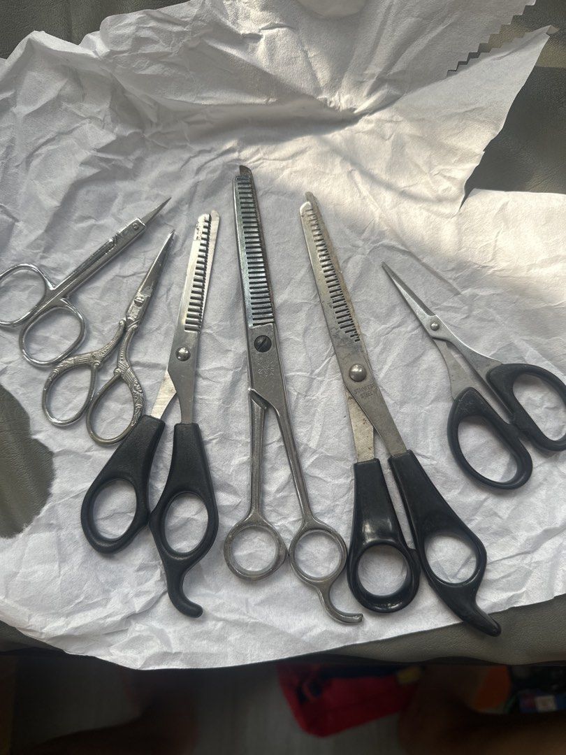 Assorted Hair Cutting and Thinning Scissors Set (Category: Hair) located in Cainta. Submitted by shopbyyna (Listing ID 1467607357, Image 1). Description: - Complete hair cutting set: includes texturizing shears, thinning scissors, and standard cutting scissors - Design: mixed handles featuring comfortable black plastic grips and stylish full metal vintage styles - Material: durable stainless steel blades - Condition: shows visible wear and tear f