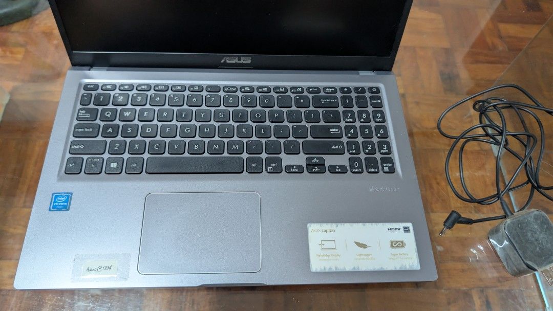 ASUS X515M Laptop with Charger (Category: Laptops & Notebooks) located in Antipolo. Submitted by ohnessafinds (Listing ID 1467751348, Image 3). Description: - Model: ASUS X515M (Grey) - Processor: Intel Celeron - perfect for online classes, school work, and daily browsing - Keyboard: Full-size layout complete with a numeric keypad - Display: Standard ~15-inch screen - Condition: Clean body, works perfectly - Inclusions: Original charging brick an