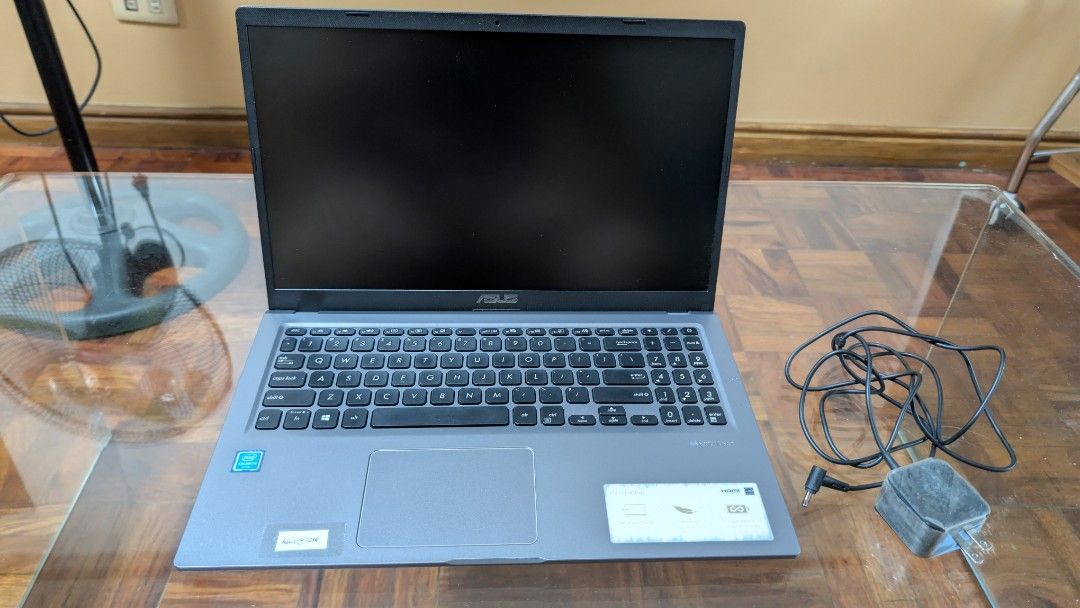 ASUS X515M Laptop with Charger (Category: Laptops & Notebooks) located in Antipolo. Submitted by ohnessafinds (Listing ID 1467751348, Image 2). Description: - Model: ASUS X515M (Grey) - Processor: Intel Celeron - perfect for online classes, school work, and daily browsing - Keyboard: Full-size layout complete with a numeric keypad - Display: Standard ~15-inch screen - Condition: Clean body, works perfectly - Inclusions: Original charging brick an