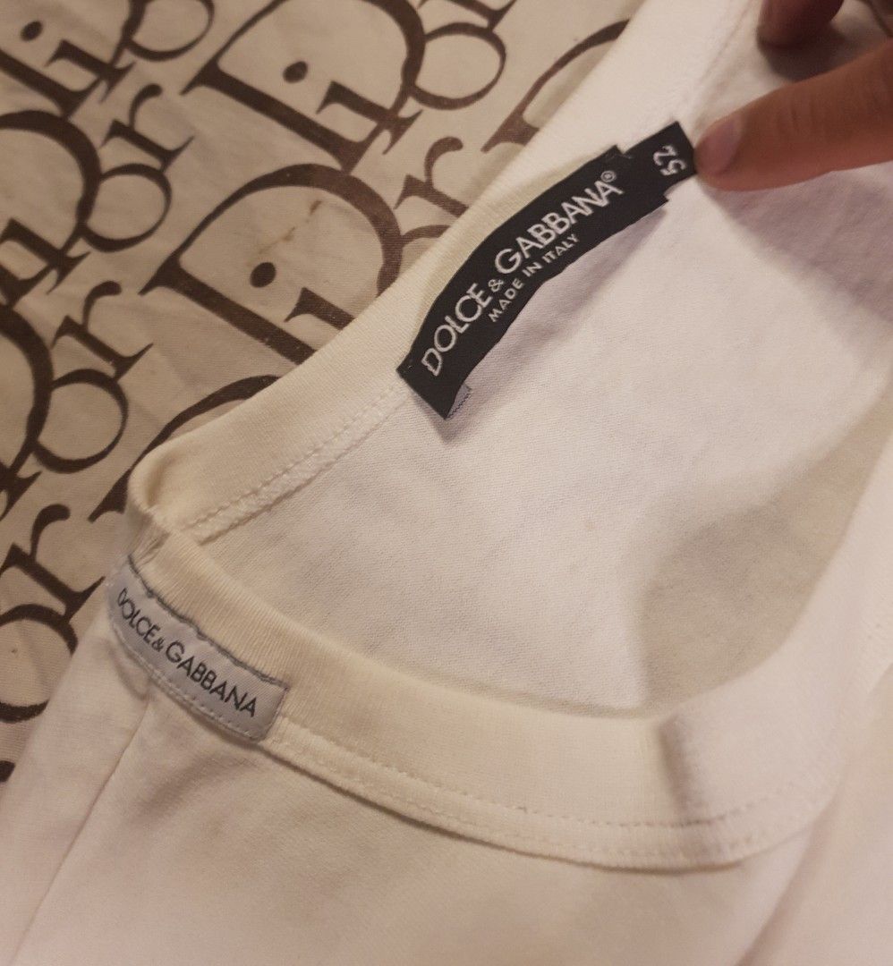 Authentic Dolce and Gabanna shirt (Category: Shirts) located in San Fernando. Submitted by retro.district. (Listing ID 1467820357, Image 3). Description: - Authentic D&G patchwork tshirt - Size: Large - Condition: Excellent - No issue.