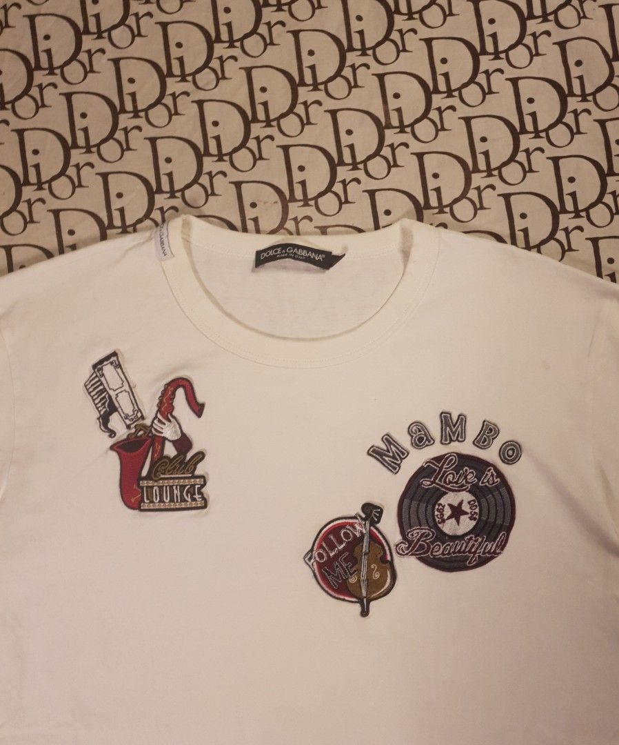 Authentic Dolce and Gabanna shirt (Category: Shirts) located in San Fernando. Submitted by retro.district. (Listing ID 1467820357, Image 2). Description: - Authentic D&G patchwork tshirt - Size: Large - Condition: Excellent - No issue.