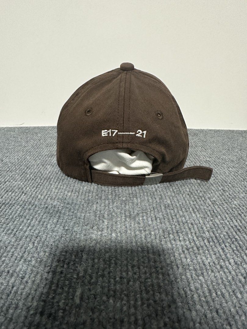 Authentic Emis Brown Baseball Cap (Category: Caps & Hats) located in Manila. Submitted by andy0729 (Listing ID 1467710863, Image 3). Description: Authentic ❤️ - Brand: Emis - Color: Brown with white embroidered logo - Material: 100% Cotton, made in Korea - Features: Clean structure, neat stitching, and text detail on the back - Fit: Adjustable metal buckle closure - Care: Hand wash only.