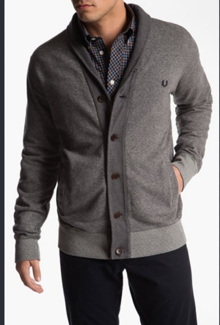 Authentic Fred Perry Shawl Collar Cardigan Grey Size L (Category: Coats, Jackets and Outerwear) located in Solana. Submitted by sonnymcamp28502 (Listing ID 1467671468, Image 1). Description: Fred Perry cardigan in grey. Size L, made in Portugal from 100 percent cotton. Shawl collar design with button-up front and front pockets. Blue plaid fabric lining inside the collar area. Laurel wreath embroidered logo on the chest. Tag still attached with pl