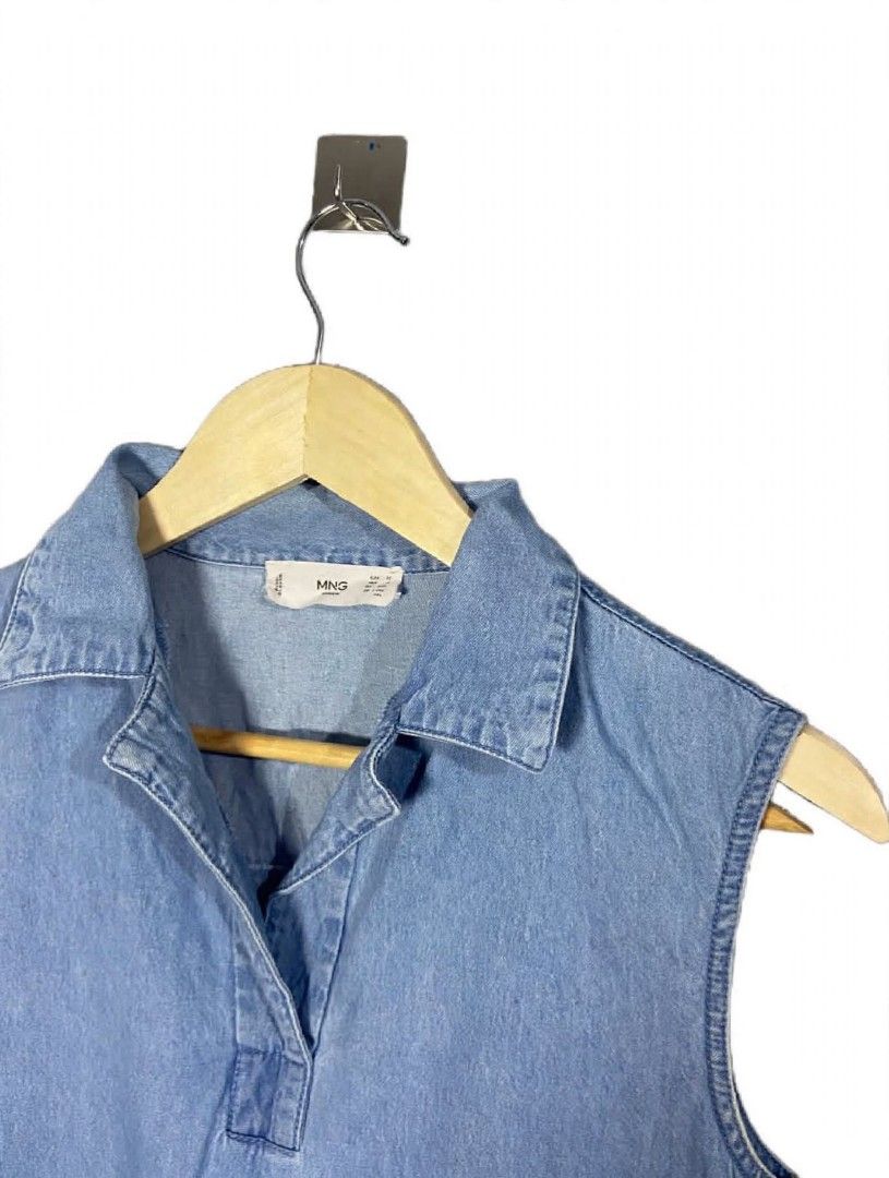 Authentic MANGO Women's Blue Pure Cotton Solid Denim Top (Category: Others Tops) located in Taguig. Submitted by owlthrifty (Listing ID 1467759393, Image 2). Description: Size: XS Good as new ✔️💯 No issue ✔️💯.