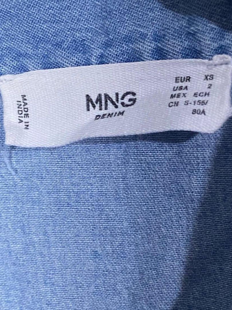 Authentic MANGO Women's Blue Pure Cotton Solid Denim Top (Category: Others Tops) located in Taguig. Submitted by owlthrifty (Listing ID 1467759393, Image 3). Description: Size: XS Good as new ✔️💯 No issue ✔️💯.