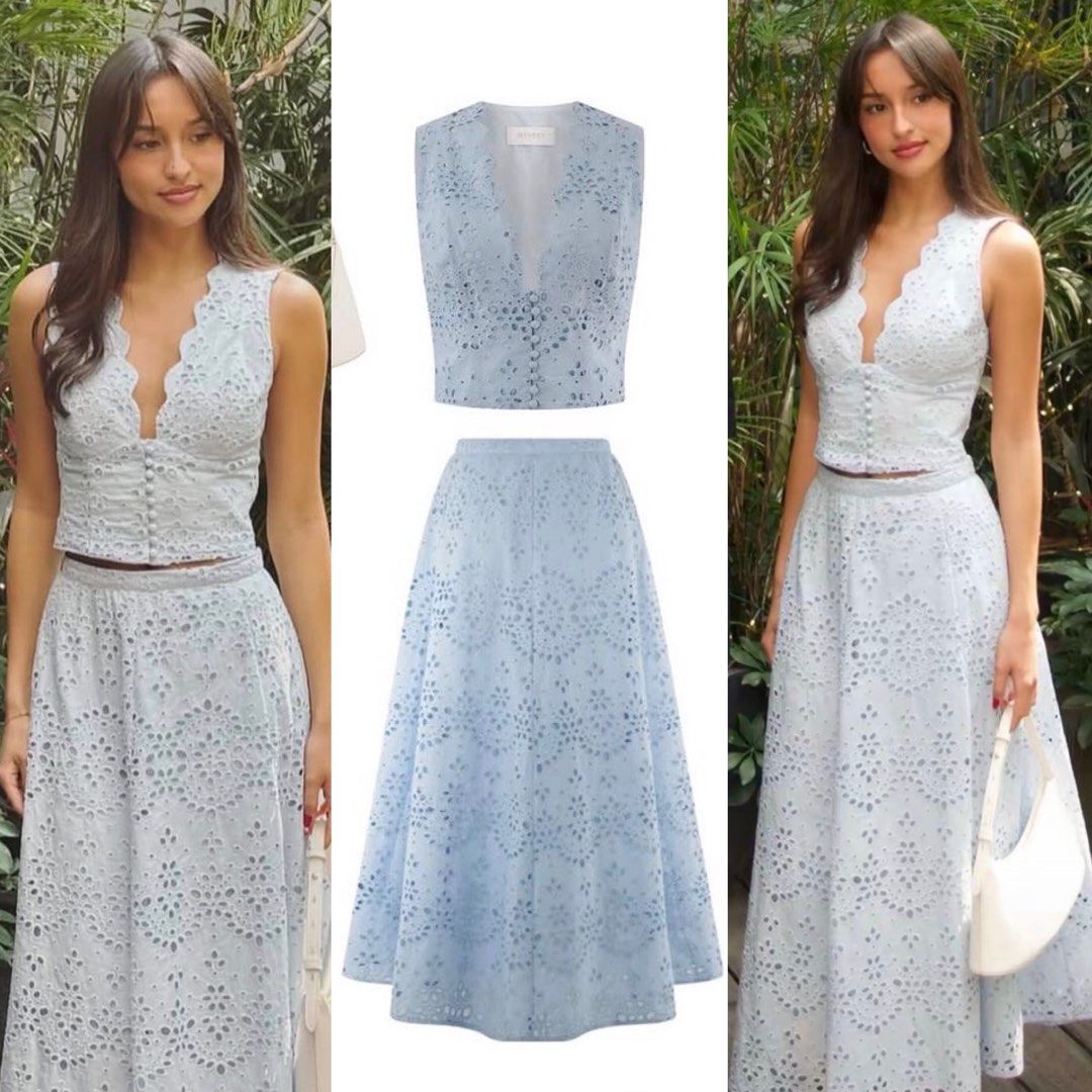 Authentic Meshki Arla Set baby blue (Category: Sets or Coordinates) located in Cebu City. Submitted by jad088 (Listing ID 1467692724, Image 1). Description: - Set: Matching baby blue crop top and midi skirt - Top: Sleeveless vest style, deep V-neck, scalloped edges, button-front closure - Skirt: High-waisted, A-line midi length - Condition: Worn once - Occasion: Ideal for brunch, dates, or garden parties.