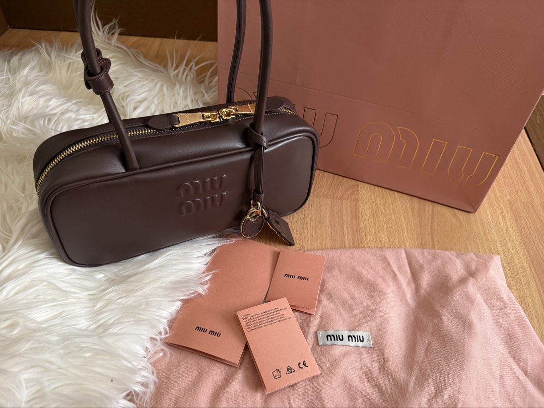 Authentic MiuMiu Beau (Category: Luxury Bags & Wallets) located in Davao. Submitted by hoardshopdavao (Listing ID 1467676617, Image 3). Description: Authentic! Pasabuy from HK! Selling very low since inclusions are paperbag dustbag and cards only. Really good deal na no issues at all ☺️.