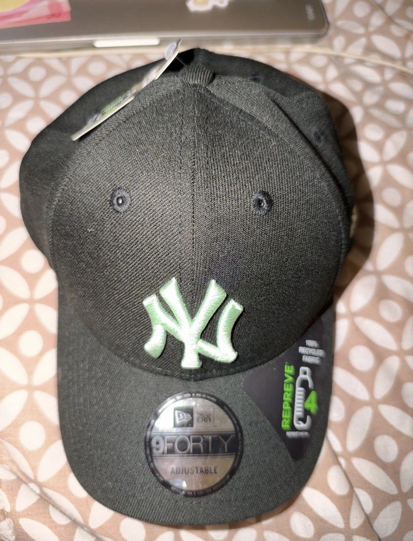 AUTHENTIC New Era NY Yankees 9FORTY Adjustable Cap (Category: Caps & Hats) located in Paranaque City. Submitted by f0rtune_88 (Listing ID 1467730304, Image 2). Description: FIXED PRICE Brand: New Era Size: One Size Fits Most (Adjustable) Color: Black / Mint Green Style: 9FORTY Baseball Cap Fit: Adjustable Details: Embroidered NY Yankees logo, curved brim, New Era side logo, REPREVE recycled fabric, original stickers and tags attached Condition: U