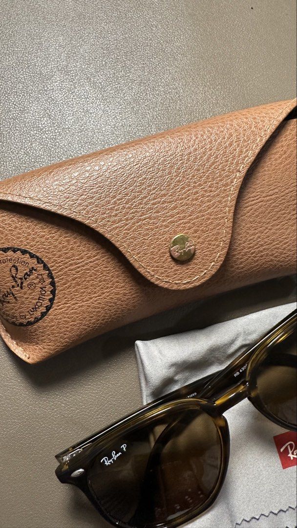 Authentic Polarized Raybans RB4306 (Category: Sunglasses & Eyewear) located in Pasay City. Submitted by jeannesee (Listing ID 1467662122, Image 3). Description: - Brand: Ray-Ban - Model: RB4306 710/83 54-19 145 3P - Frame: Tortoise shell - Lenses: Dark brown, polarized (3P) - Origin: Made in Italy - Inclusions: Light brown leatherette hard case, cleaning cloth with Ray-Ban logo, original packaging, and tags - Condition: Very lightly used, once or