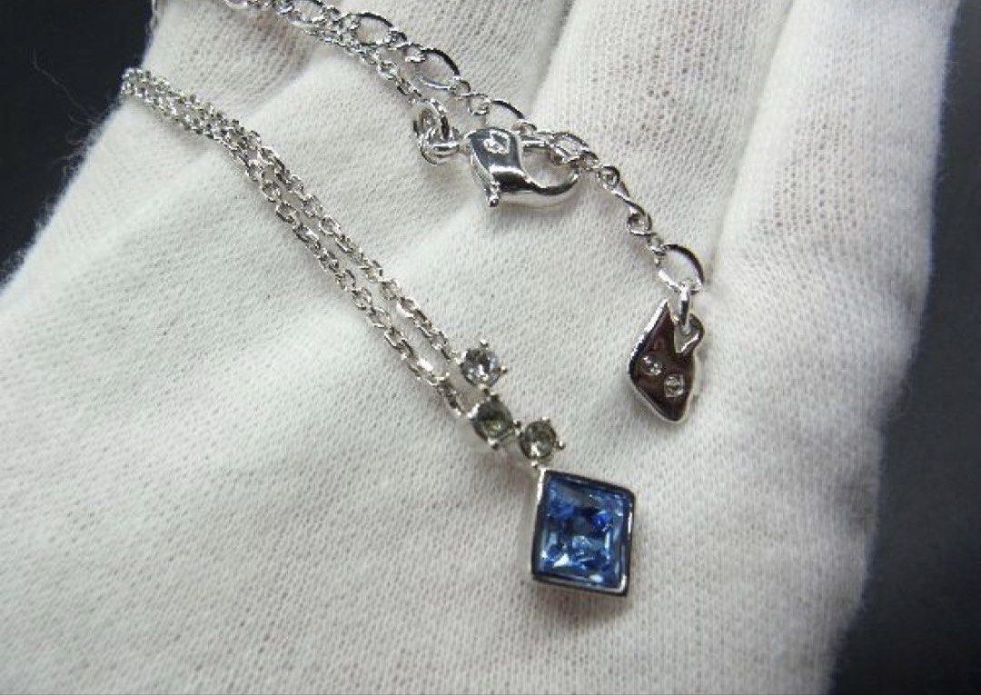 AUTHENTIC Swarovski Crystal Square Blue Necklace Pendant (Category: Necklaces) located in Davao. Submitted by my_picks (Listing ID 1467673346, Image 3). Description: AUTHENTIC Swarovski Crystal Square Blue Necklace Pendant Almost brand new! Worn only once for about 6 hours, then kept in storage. Secondhand pieces of the same necklace are selling online for US$87 (excluding shipping), around ₱4,890. Uploaded screenshots for reference on the curren