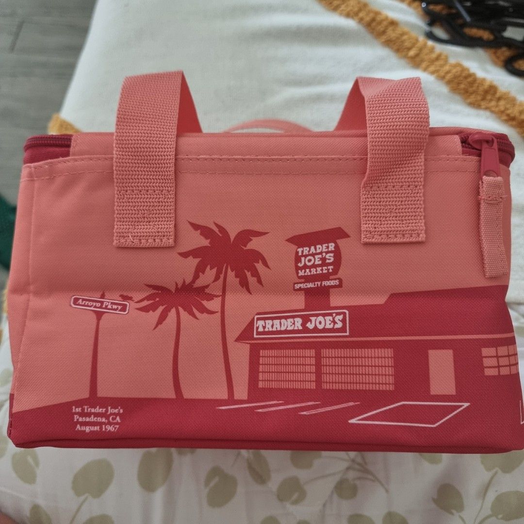 Authentic Trader Joe's Mini Insulated Lunch Bag (Category: Tote Bags) located in Las Pinas. Submitted by 2nd_soul (Listing ID 1467671062, Image 3). Description: - Brand: Trader Joe's - Color: Salmon / Orange - Design: Retro store graphic with palm trees (Pasadena, CA, Aug 1967) - Condition: Brand new with original tag attached (SKU 81833) - Capacity: Holds up to 1.5 gallons - Features: Extra thick insulated core, leak-proof, and easy to clean.