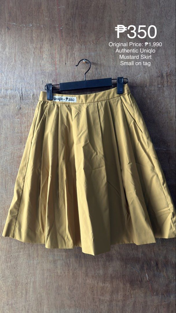 Authentic Uniqlo Mustard Skirt Small (Category: Skirts) located in Cavite. Submitted by __elizagarcia.xi (Listing ID 1467775836, Image 1). Description: - Brand: Authentic Uniqlo - Color: Mustard (great pop of color!) - Size: Small (Waist: 60-66 cm, Hips: 85-91 cm) - Material: Polyester, nylon, and polyurethane blend - Features: Elegant knife pleats and comfortable waistband - Condition: Excellent - Price: ₱350 only (Original Price: ₱1,990).