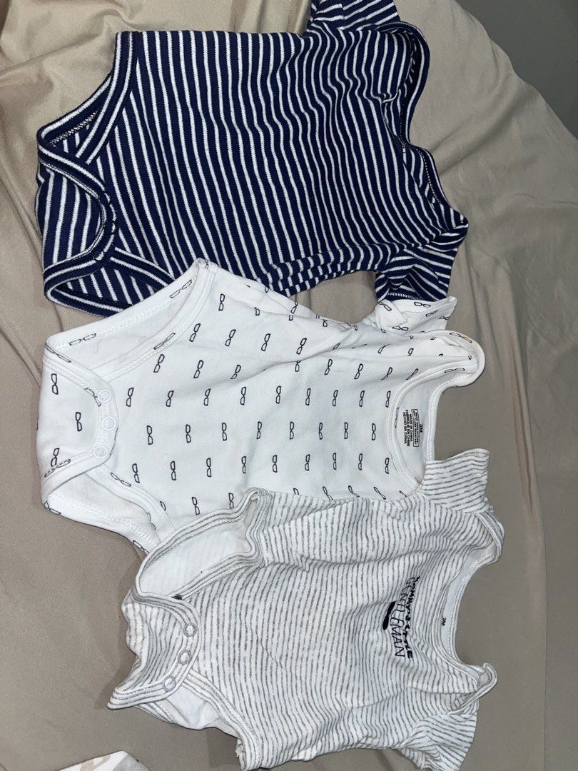Baby Bodysuits and Sleepsuits Bundle (Category: Babies & Kids Fashion) located in Caloocan City. Submitted by starosaeli09861 (Listing ID 1467741301, Image 1). Description: preloved baby boy onesies and frogsuits sizes more on 3-6M. MUST TAKE ALL 1k. Novaliches QC - Bundle of baby boy bodysuits and sleepsuits - Assorted cute patterns including stripes, animal prints, and mustache designs - Made from soft, breathable cotton - Features snap buttons