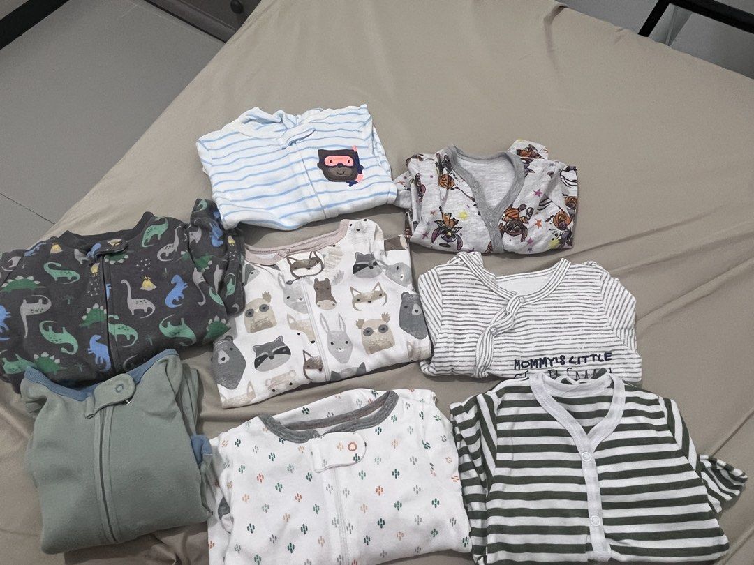 Baby Bodysuits and Sleepsuits Bundle (Category: Babies & Kids Fashion) located in Caloocan City. Submitted by starosaeli09861 (Listing ID 1467741301, Image 3). Description: preloved baby boy onesies and frogsuits sizes more on 3-6M. MUST TAKE ALL 1k. Novaliches QC - Bundle of baby boy bodysuits and sleepsuits - Assorted cute patterns including stripes, animal prints, and mustache designs - Made from soft, breathable cotton - Features snap buttons