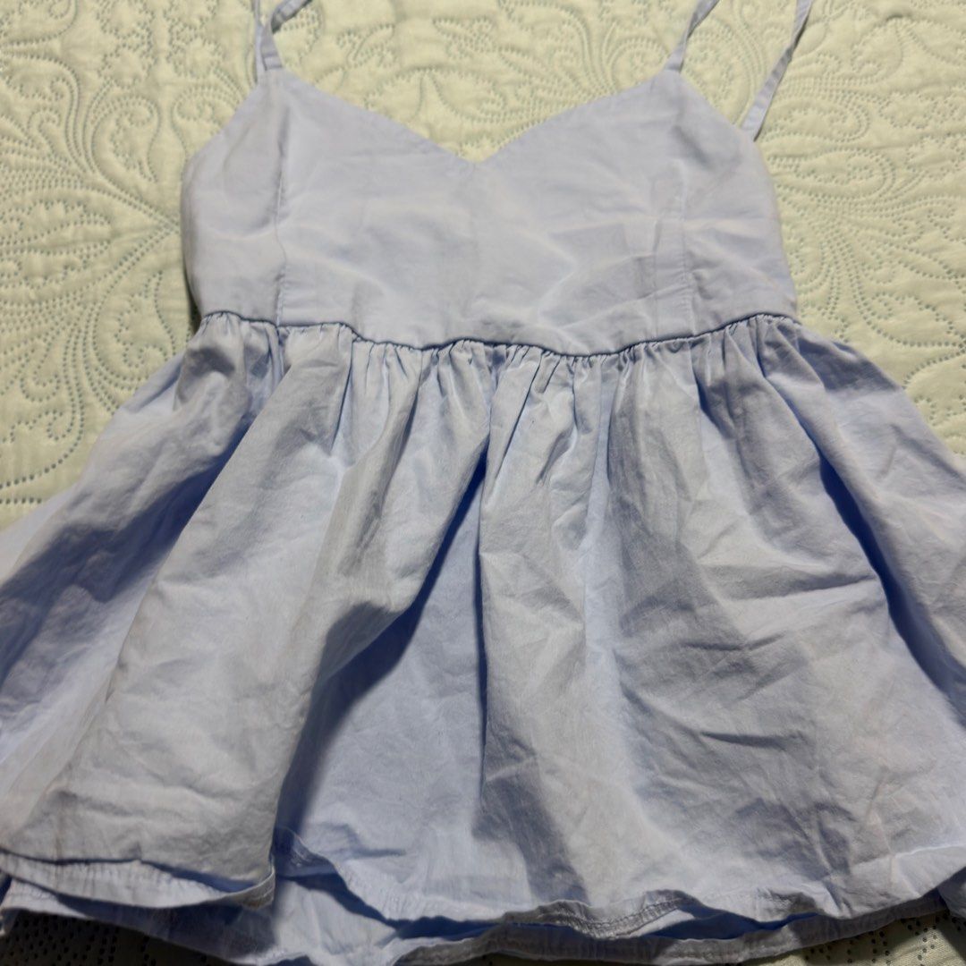 Babydoll Peplum Top (Category: Blouses) located in Cebu City. Submitted by shopjillscloset (Listing ID 1467753678, Image 2). Description: - no issues - worn once - dm for ww - zipper enclosure on the side.