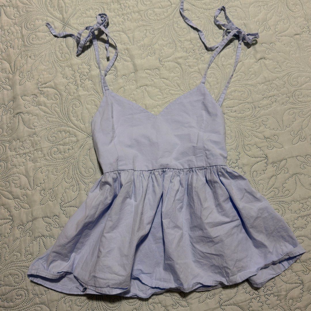 Babydoll Peplum Top (Category: Blouses) located in Cebu City. Submitted by shopjillscloset (Listing ID 1467753678, Image 1). Description: - no issues - worn once - dm for ww - zipper enclosure on the side.