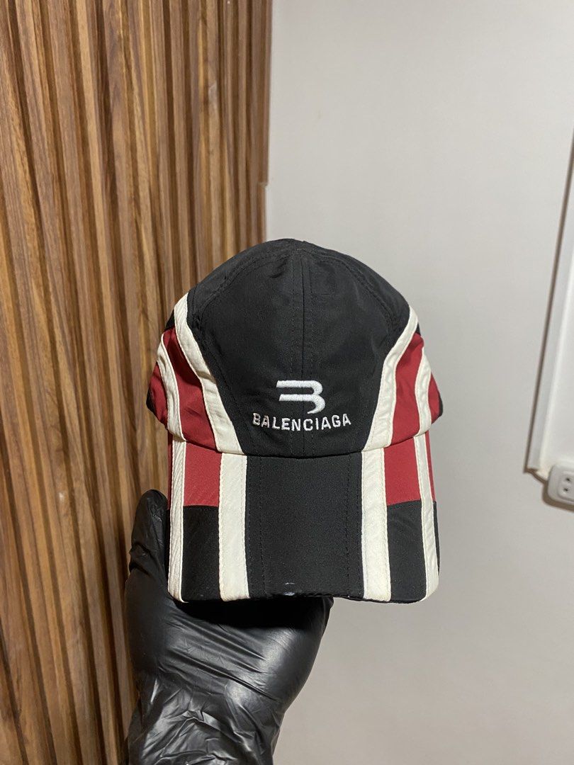 Balenciaga Multi-Panel Baseball Cap (Category: Caps & Hats) located in Caloocan City. Submitted by heatedcaps4425 (Listing ID 1467799714, Image 1). Description: - Brand: Balenciaga - Design: Black, red, and white colorblock with embroidered front logo - Material: Lightweight nylon with inner fabric care labels - Fit: Adjustable Velcro strap at the back with woven brand tag inside - Shape: Clean structure with a curved brim - Condition: Brand new 