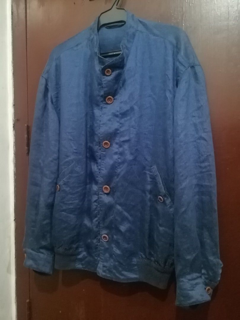 Bally Blue Casual lightweight Jacket (Category: Coats, Jackets and Outerwear) located in Manila. Submitted by alden_apparel (Listing ID 1467800944, Image 3). Description: - Authentic Vintage Bally blue jacket - Band collar with stylish contrast brown buttons - Convenient side pockets - no lining - Ribbed hem and cuffs for a snug fit - Great casual layer for cooler weather - Linen blend lightweight material - Good condition.