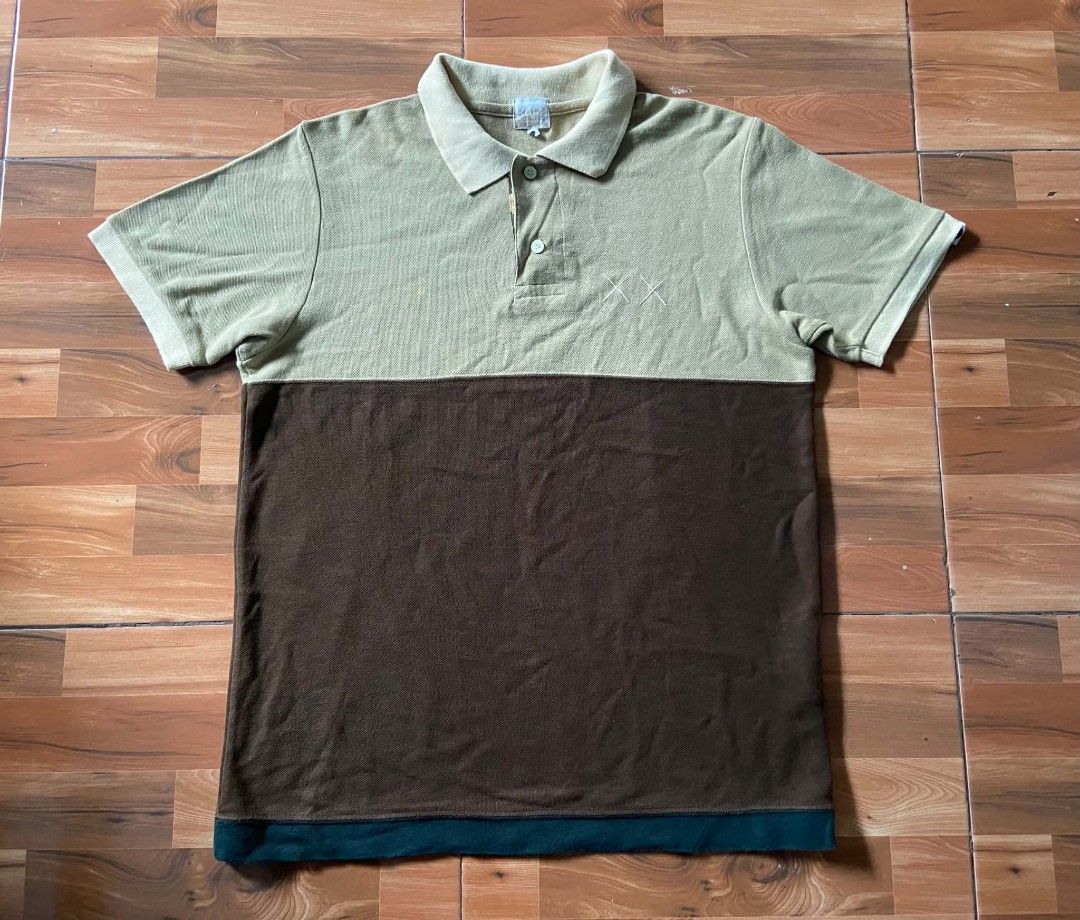 BAPE / KAWS POLO (Category: Tshirts & Polo Shirts ) located in Nabua. Submitted by supermix5119 (Listing ID 1467640903, Image 1). Description: Bape / Kaws Polo Small Length:26 Width:20 Very Good Condition Issue:Kunting Discoloration 1300+Sf.
