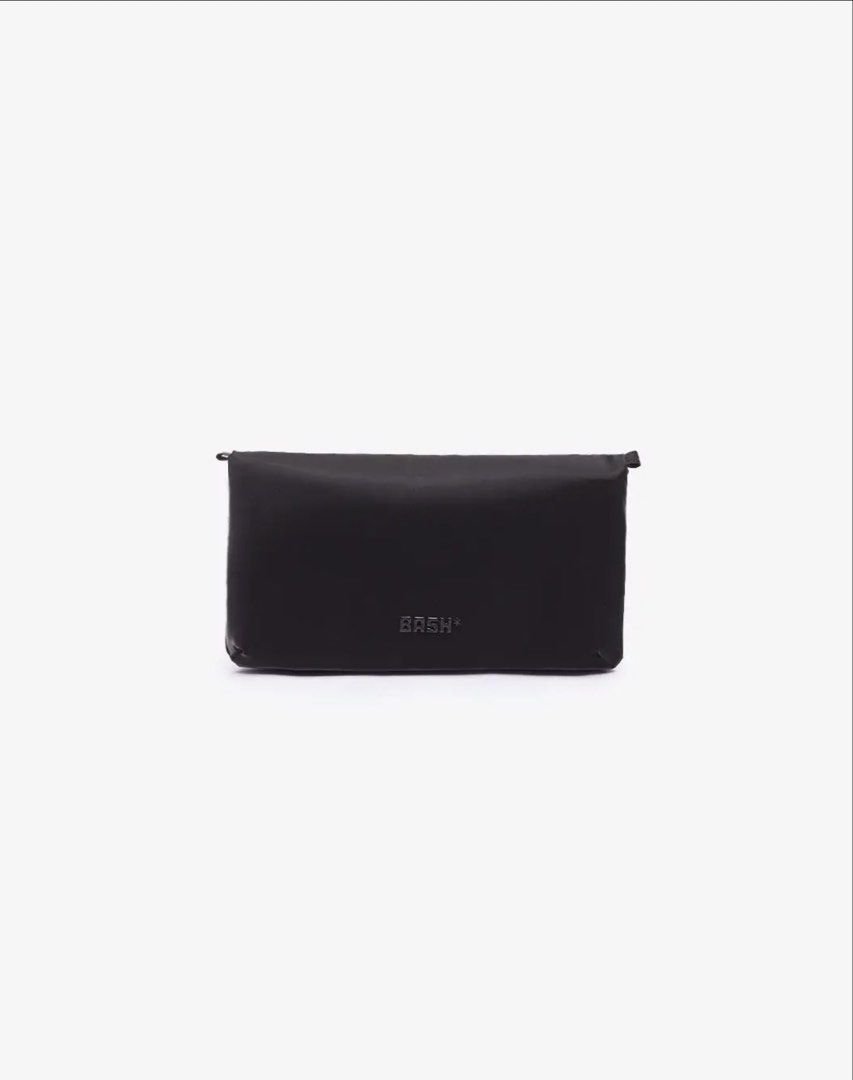 BASH* | Cache Wallet in Carbon (Category: Wallets & Card holders) located in Quezon City. Submitted by avenue.de.belle (Listing ID 1467709072, Image 2). Description: BASH* | Cache Wallet in Carbon Brand New Color: Carbon DESCRIPTION Your travel essentials, all in one place. The Cache Wallet keeps your boarding pass, passport, cards, currencies, and phone organized across multiple compartments, with a hidden back pocket for valuables you want to k