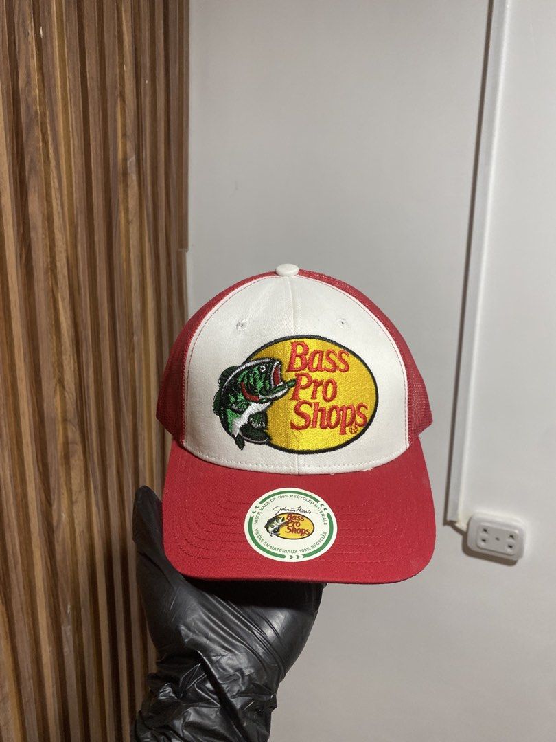 Bass Pro Shops Mesh Trucker Hat Red White (Category: Caps & Hats) located in Caloocan City. Submitted by heatedcaps4425 (Listing ID 1467804005, Image 1). Description: - Brand new with original store tags - Classic red and white colorway with embroidered bass logo patch - Breathable mesh back panels for all-day comfort - Adjustable snapback closure for a customizable fit - Eco-friendly design made from recycled materials - One size fits most adult