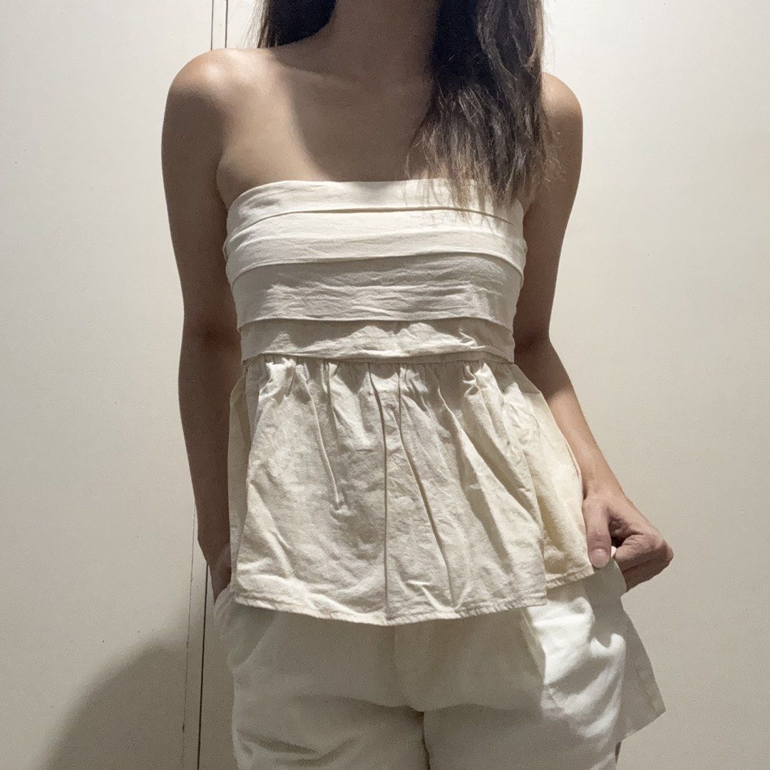 Beige Peplum Tube Top (Category: Sleeveless) located in Antipolo. Submitted by nicnicbg (Listing ID 1467668676, Image 1). Description: Free size, garterized back.