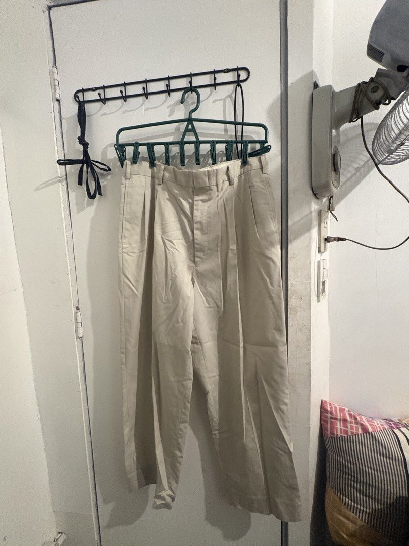 Beige Pleated Trousers large-xl (Category: Trousers) located in Pasig City. Submitted by meowdei (Listing ID 1467739111, Image 2). Description: bought this as a preloved too but never worn 🤓 still too tight for me. this is size 32-34! - mop: gcash, bpi, maribank, metrobank - mod: lalamove, grab, jnt - can do meet up as long as within/around ortigas! :) .