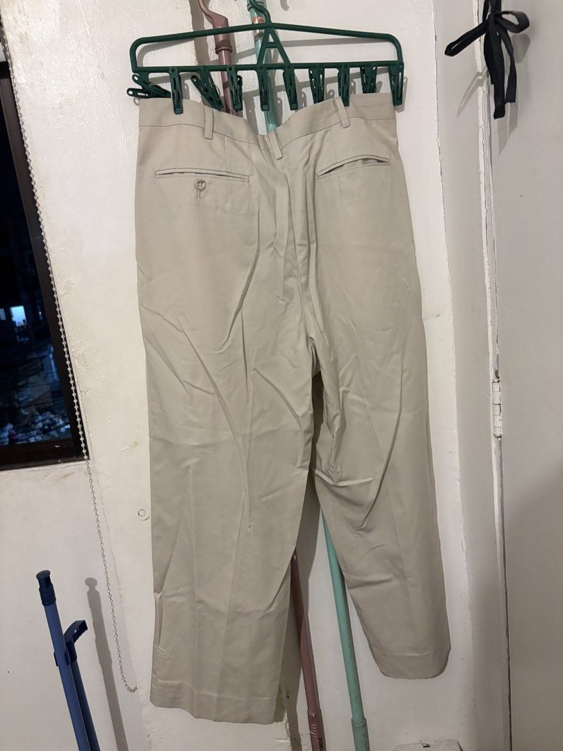 Beige Pleated Trousers large-xl (Category: Trousers) located in Pasig City. Submitted by meowdei (Listing ID 1467739111, Image 3). Description: bought this as a preloved too but never worn 🤓 still too tight for me. this is size 32-34! - mop: gcash, bpi, maribank, metrobank - mod: lalamove, grab, jnt - can do meet up as long as within/around ortigas! :) .