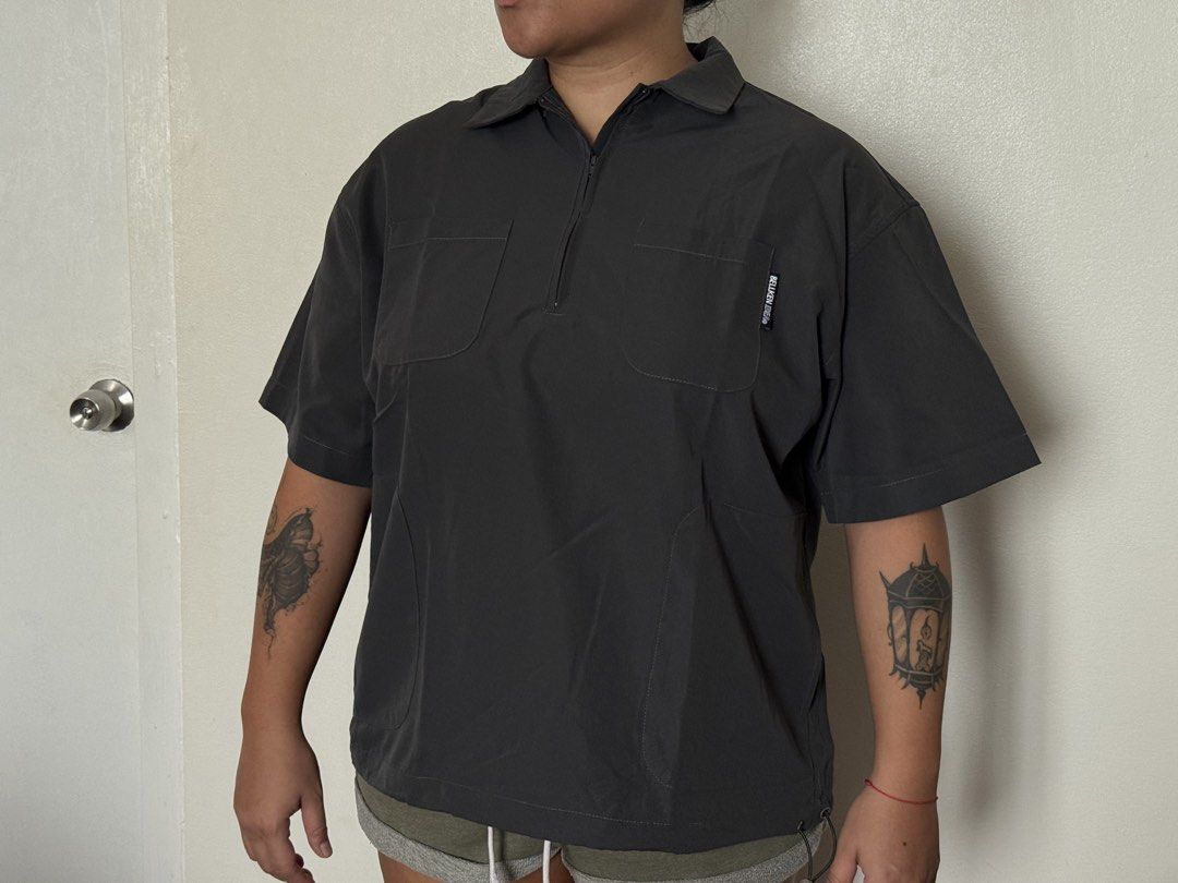 Bellken Idea Gorpcore Quarter Zip Polo (Category: Tshirts & Polo Shirts ) located in Quezon City. Submitted by thecurvycorner (Listing ID 1467647170, Image 1). Description: - Brand: Bellken Idea - Has an adjustable drawstring hem - Model’s measurements: 24in, shoulder to shoulder.