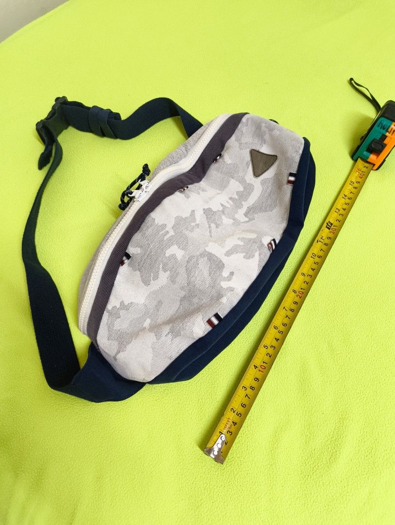 Beltbag with Adjustable Strap (Category: Announcements) located in Angeles City. Submitted by MTstuffs (Listing ID 1467633565, Image 3). Description: White camo Belt bag , ykk zip...measuring 25 inches long with dark blue trim kasya 50 inch waistline, adjustable strap, and a dual-zipper main closure. The interior features grey lining, multiple slip pockets, and a zippered pocket. Stylish, spacious, and great for daily use. Washable 😊.