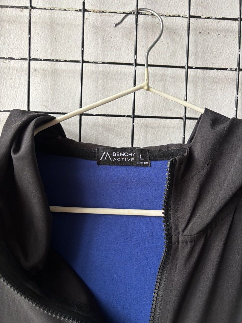 Bench Active Colorblock Hooded Windbreaker Jacket Size L (Category: Coats, Jackets and Outerwear) located in Santa Rosa. Submitted by hannaharcexx (Listing ID 1467639612, Image 3). Description: - Brand: Bench Active - Size: Large Unisex - Design: Colorblock (Black, Bright Blue, Lime Green) - Features: Full zip front, attached hood, elasticized cuffs and hem - Pockets: Convenient matching zipper pockets on sleeves - Interior: Contrasting blue lini