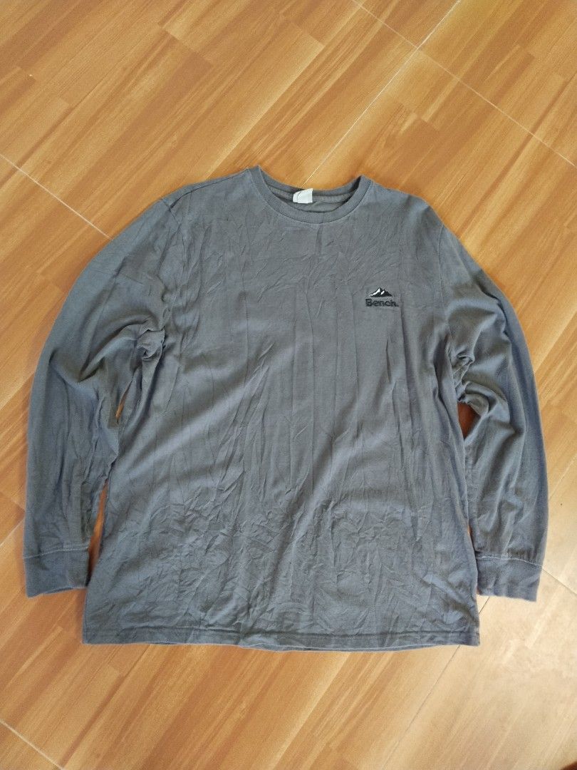 Bench Embroidered Mountain Long Sleeve — Size XL (Category: Tshirts & Polo Shirts ) located in Mabalacat. Submitted by al_amin_thrift (Listing ID 1467692688, Image 1). Description: Bench Embroidered Mountain Long Sleeve — Size XL ✔️ Authentic Bench — 100% premium cotton ✔️ Charcoal gray — easy to match everyday color ✔️ Embroidered mountain logo — subtle, clean design ✔️ Classic crew neck long sleeve ✔️ Size XL — relaxed comfortable fit ✔️ Excell