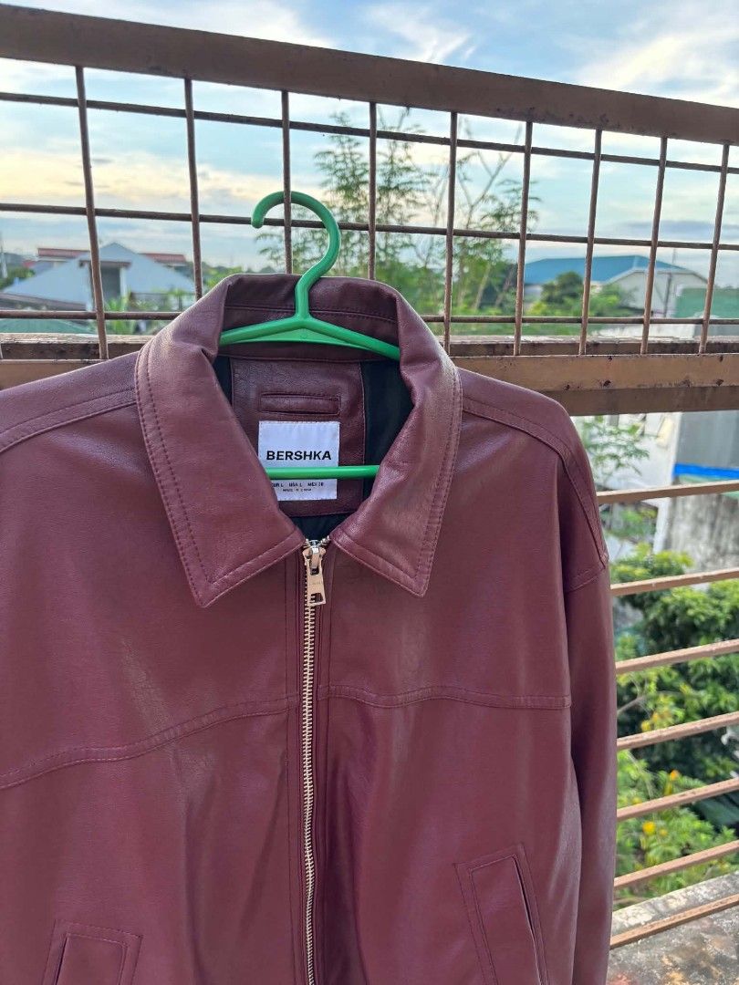 Bershka leather jacket (Category: Coats, Jackets and Outerwear) located in Manila. Submitted by philr80538 (Listing ID 1467628398, Image 2). Description: - Bershka Faux Lether Jacket - Size: L - Color: Maroon - Condition: Excellent, clean with no flaws No issue - used once 3200 nego loc north caloocan.