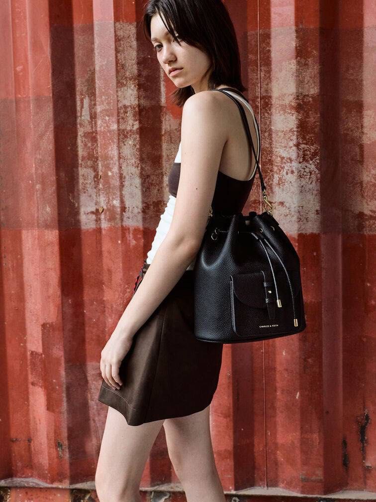 Beryl Drawstring Backpack (Category: Bags & Wallets) located in Kuala Lumpur. Submitted by trust_preloved (Listing ID 1467680393, Image 2). Description: Beryl Drawstring Backpack Model : 60151619 Price : RM179 Material : Recycled Leather Size (CM) : 25 x 27 x 13 Color : Black , Chocolate.