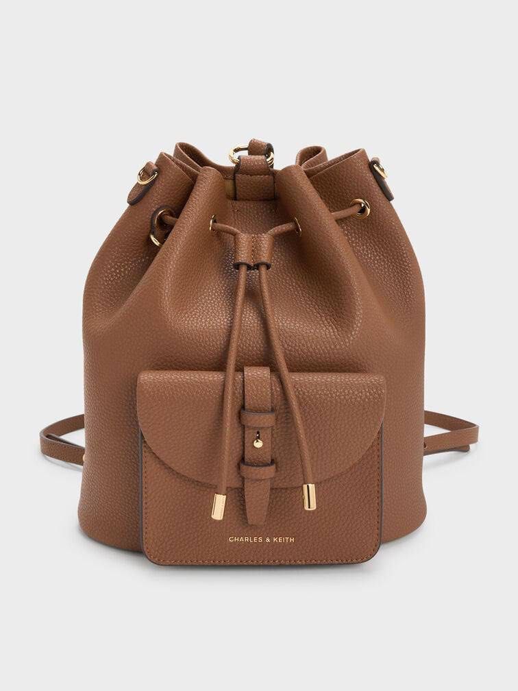 Beryl Drawstring Backpack (Category: Bags & Wallets) located in Kuala Lumpur. Submitted by trust_preloved (Listing ID 1467680393, Image 3). Description: Beryl Drawstring Backpack Model : 60151619 Price : RM179 Material : Recycled Leather Size (CM) : 25 x 27 x 13 Color : Black , Chocolate.