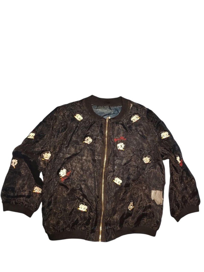 Betty Boop Black Bomber Jacket (Category: Coats, Jackets and Outerwear) located in Manila. Submitted by fastforest_65f95b (Listing ID 1467649338, Image 1). Description: - Official © 2015 King Features Syndicate Betty Boop merchandise - Color: Black - Design: Full zip front with scattered embroidered Betty Boop patches on front and sleeves - Details: Ribbed collar, cuffs, and hem - Material: Lightweight crushed velvet / textured fabric style - Con