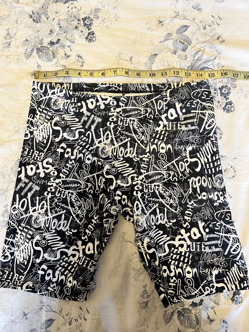 Renoma Black and White Graffiti Print Jammers (Category: Shorts) located in Tabaco. Submitted by edmarbron (Listing ID 1467793911, Image 1). Description: - Design: Edgy black and white graffiti print and doodles (100cm) - Comfort: Elastic waistband for an easy, comfortable fit - Material: Lightweight and quick-drying, great for swimming or casual beach days - Size: Measures approx. 15 to 16 inches across the waist (flat lay) - Condition: Brand ne