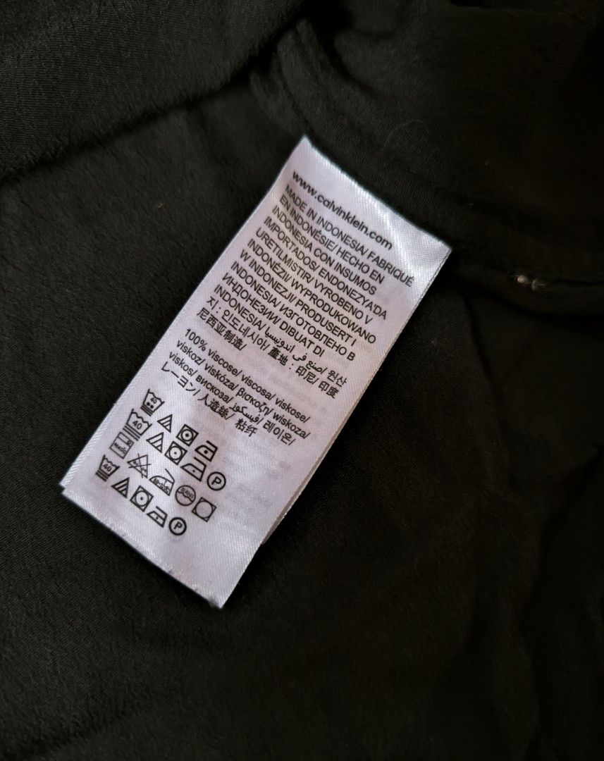 Black Calvin Klein plain blouse (Category: Blouses) located in Manila. Submitted by wearforce (Listing ID 1467763704, Image 3). Description: Black Calvin Klein plain blouse fit: M-L good condition color rate 10/10 350 + sf.
