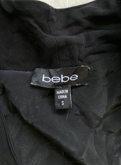 Black Crossover Romper (Category: Rompers) located in Rizal. Submitted by sheeraay (Listing ID 1467660050, Image 2). Description: - Brand: bebe - Size: S - Color: Classic black .