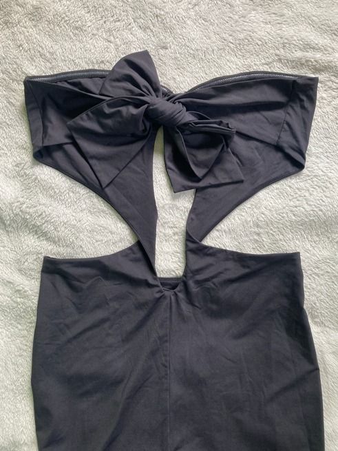 Black Cutout Self tie Midi Dress (Category: Dresses) located in Rizal. Submitted by sheeraay (Listing ID 1467656118, Image 3). Description: - Color: Sleek black - Fit: Bodycon style with stretchy fabric.