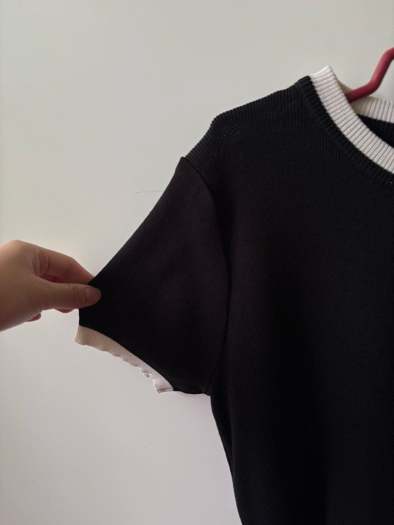 Black knitted top with white details (Category: Blouses) located in Makati City. Submitted by ssofiasellss (Listing ID 1467632201, Image 2). Description: Got this from Seoul No flaws Fits up to L.