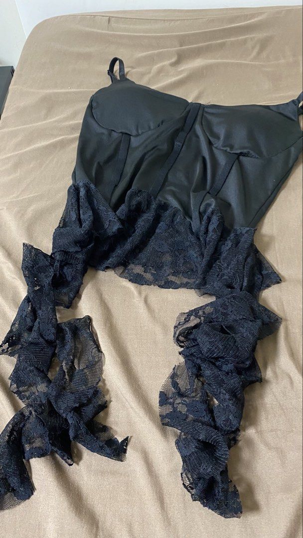 Black Lace Trim Corset Top (Category: Others Tops) located in Manila. Submitted by gelmagtira87162 (Listing ID 1463201995, Image 2). Description: - Black corset top - Adjustable straps - Lace trim hem with dangling lace details - Boning details for structure - Great for layering or wearing on its own - Adds edge to any outfit - Perfect for nights out or special occasions.