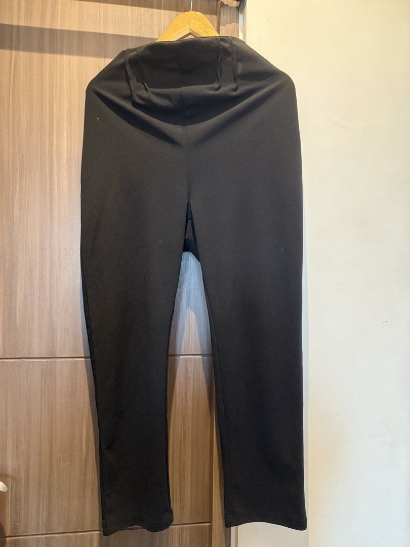 Black maternity trousers overbump ankle length pants (Category: Jeans) located in Taguig. Submitted by laramagbalana (Listing ID 1467640544, Image 2). Description: - Color: Classic Black - Style: Overbump with full belly coverage - Material: Comfortable, stretchy fabric - Features: Practical side pockets - Cut: Clean-cut, ankle-length design - Versatility: Easy to mix and match for work or casual wear.