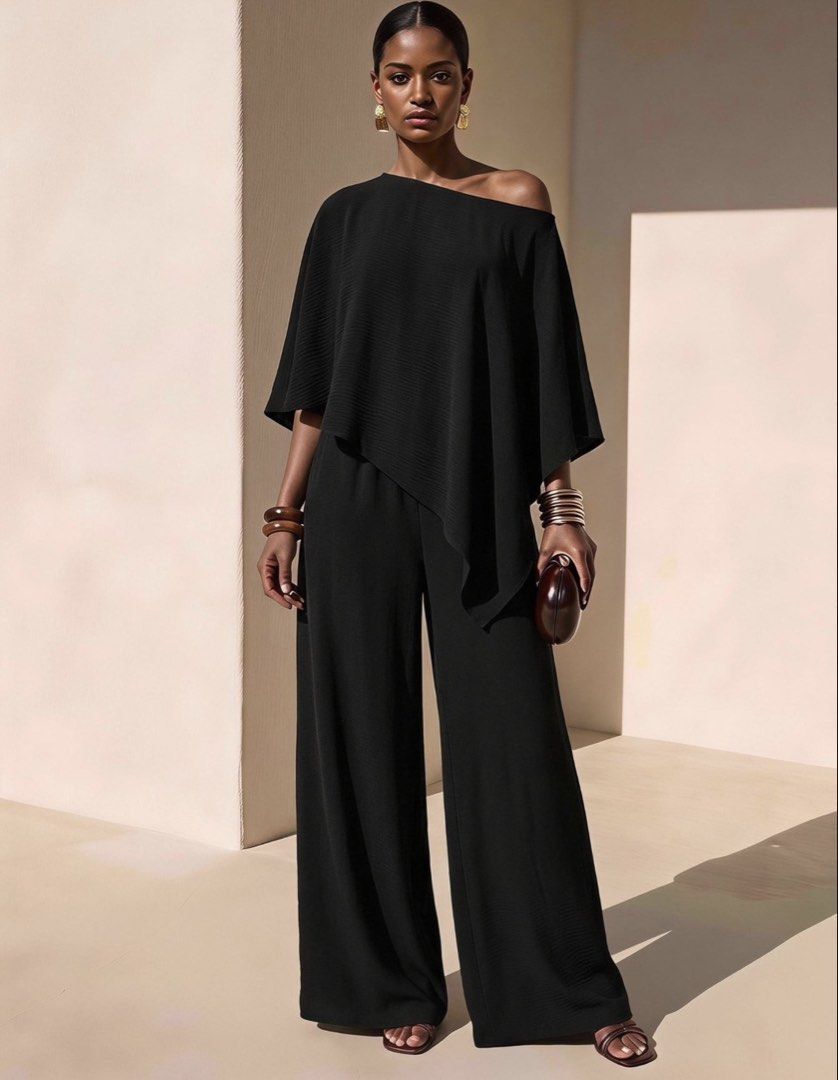 Black One-Shoulder Asymmetric Cape coordinates set (Category: Sets & Coordinates) located in Makati City. Submitted by prelovedloot (Listing ID 1467739727, Image 1). Description: - Color: Classic Black - Design: Asymmetric one-shoulder with chic overlay cape detail - Fit: Flattering wide-leg silhouette - Material: Lightweight, textured fabric with a clean drape - Occasion: Perfect for evening events, dinners, and formal gatherings - Condition: Ex