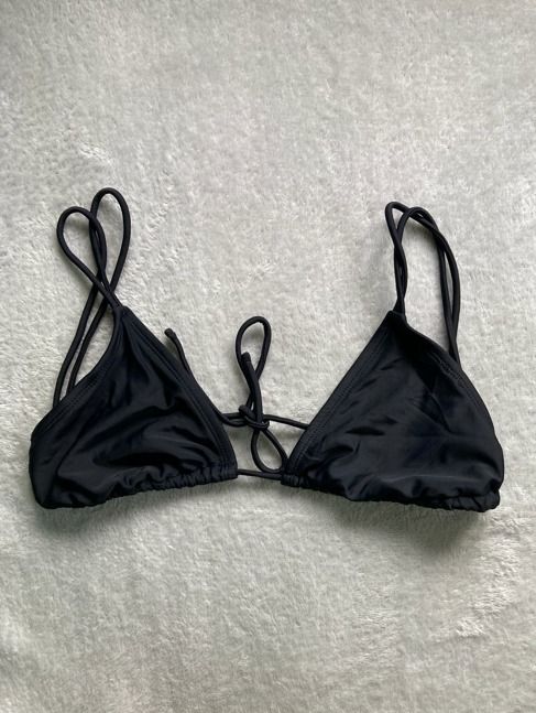 Black Triangle Bikini Top with Double Straps (Category: Bikinis & Swimsuits) located in Rizal. Submitted by sheeraay (Listing ID 1467653954, Image 2). Description: - Classic black triangle bikini top - Trendy double strap design on shoulders - Adjustable string ties in center front and back - Made from comfortable, stretchy swim fabric.