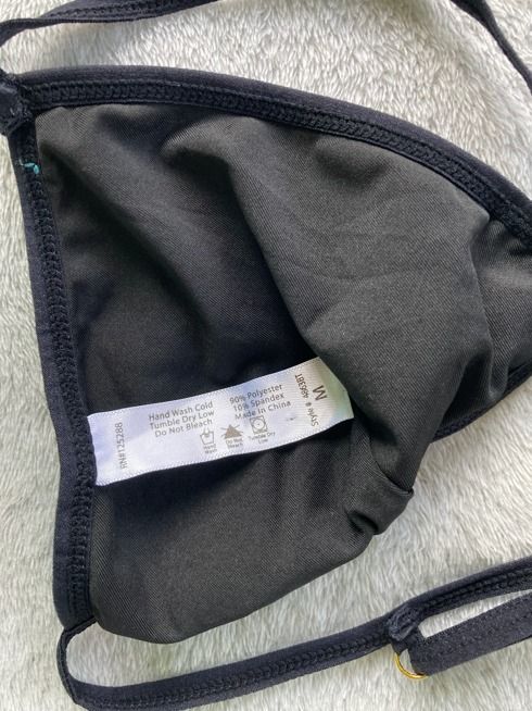 Black Triangle Bralette (Category: Undergarments & Loungewear) located in Rizal. Submitted by sheeraay (Listing ID 1467650866, Image 3). Description: - Style: Triangle bikini top - Color: Black - Size: Medium - No pad slots - Details: Adjustable straps with metal hardware rings.