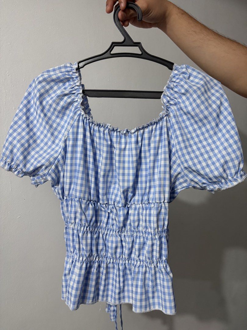 Blue and White Gingham Smocked Crop Top (Category: Blouses) located in Bulacan. Submitted by eloisereyes (Listing ID 1467750178, Image 2). Description: Size Small but can fit small - semi large body frame - Fit: Fully smocked, stretchy bodice - Condition: Worn a couple of times, still in great shape.